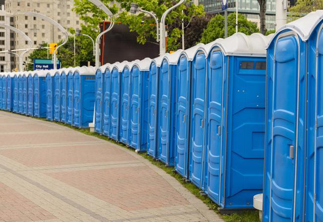 a line of portable restrooms set up for a wedding or special event, ensuring guests have access to comfortable and clean facilities throughout the duration of the celebration in Alhambra